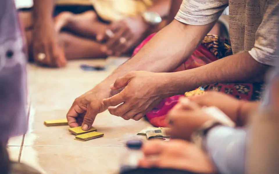 Friends around a table game